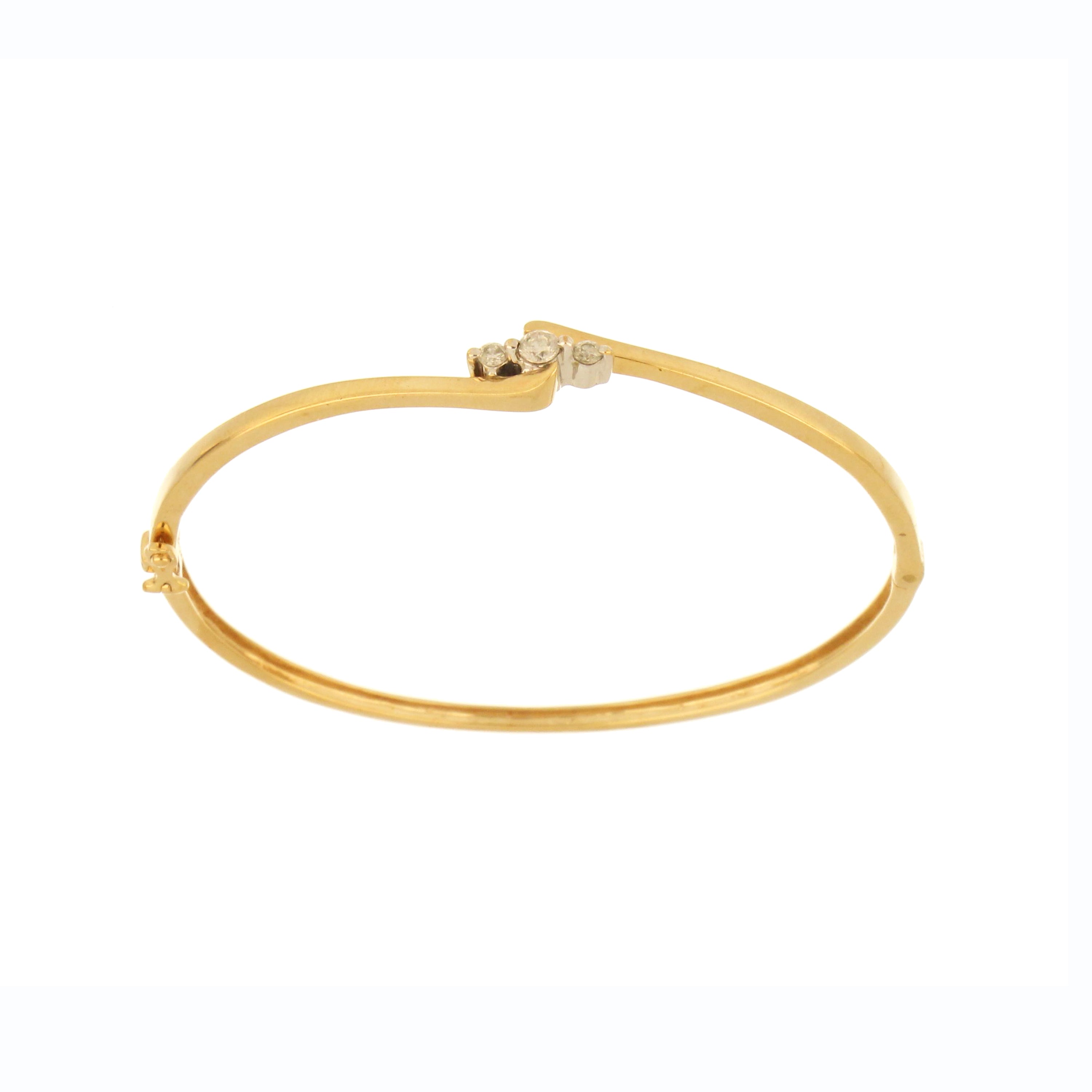 10K yellow gold diamond bangle bracelet with three round diamonds